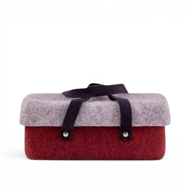Baabuk Bordeaux wool beer cooler with a grey lid, red base, and dark leather carrying strap on a white background.