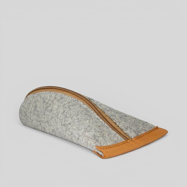 Baabuk grey wool pencil case with brown leather accents and a zippered closure for stationery or accessories.