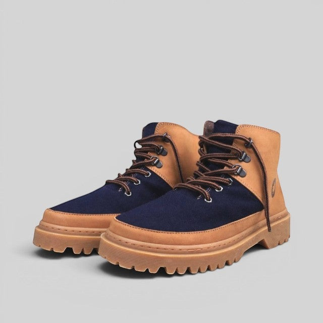 Baabuk Ice Wooler boots in navy blue wool and brown nubuck leather with a durable rubber lug sole and cotton laces.
