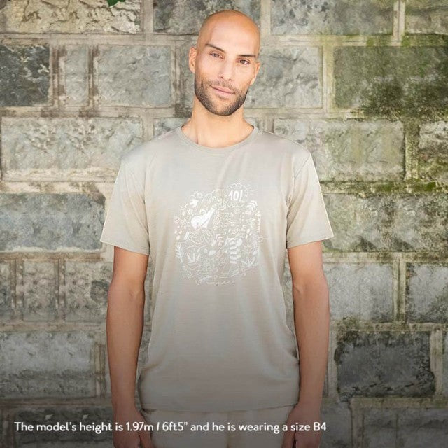 A model wearing a Baabuk khaki merino wool t-shirt with a white graphic illustration by artist Ana Seixas Santos.