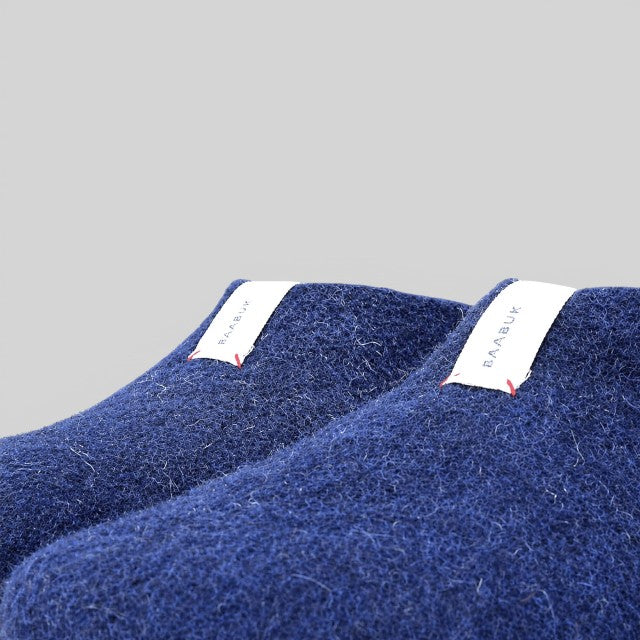 Baabuk Mel navy blue handmade wool slippers with white branded pull tabs