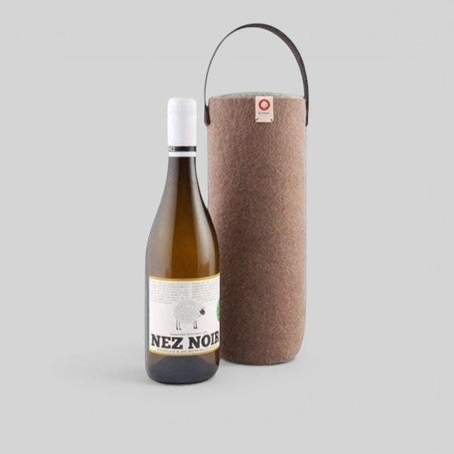 Baabuk moka wool wine cooler with a leather strap, designed to keep wine chilled without ice.