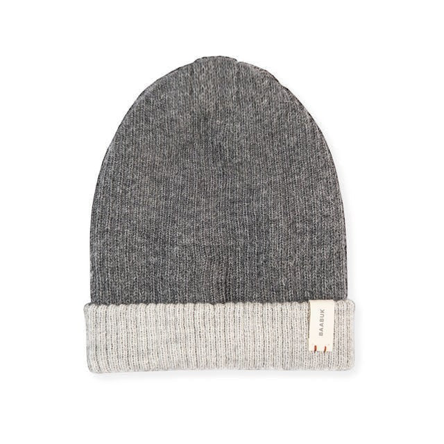 Baabuk reversible dark grey and light grey baby alpaca wool beanie with a small branded tag on the folded cuff.
