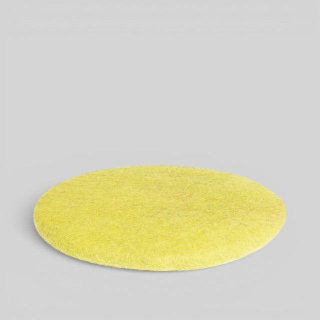 Baabuk handmade round yellow wool sitting mat made from natural New Zealand wool