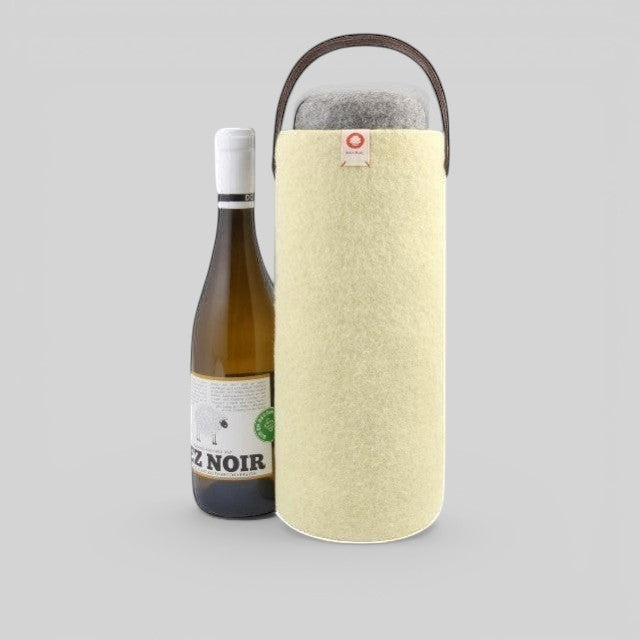 Baabuk yellow wool wine cooler with a brown leather handle, keeping a wine bottle chilled for outdoor use.